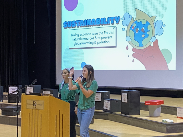 US students present about compost at LS assembly